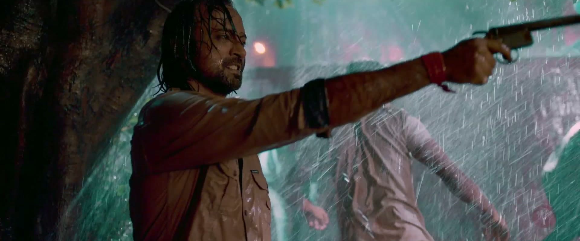Bullet Bhaiya points a pistol in the rain
