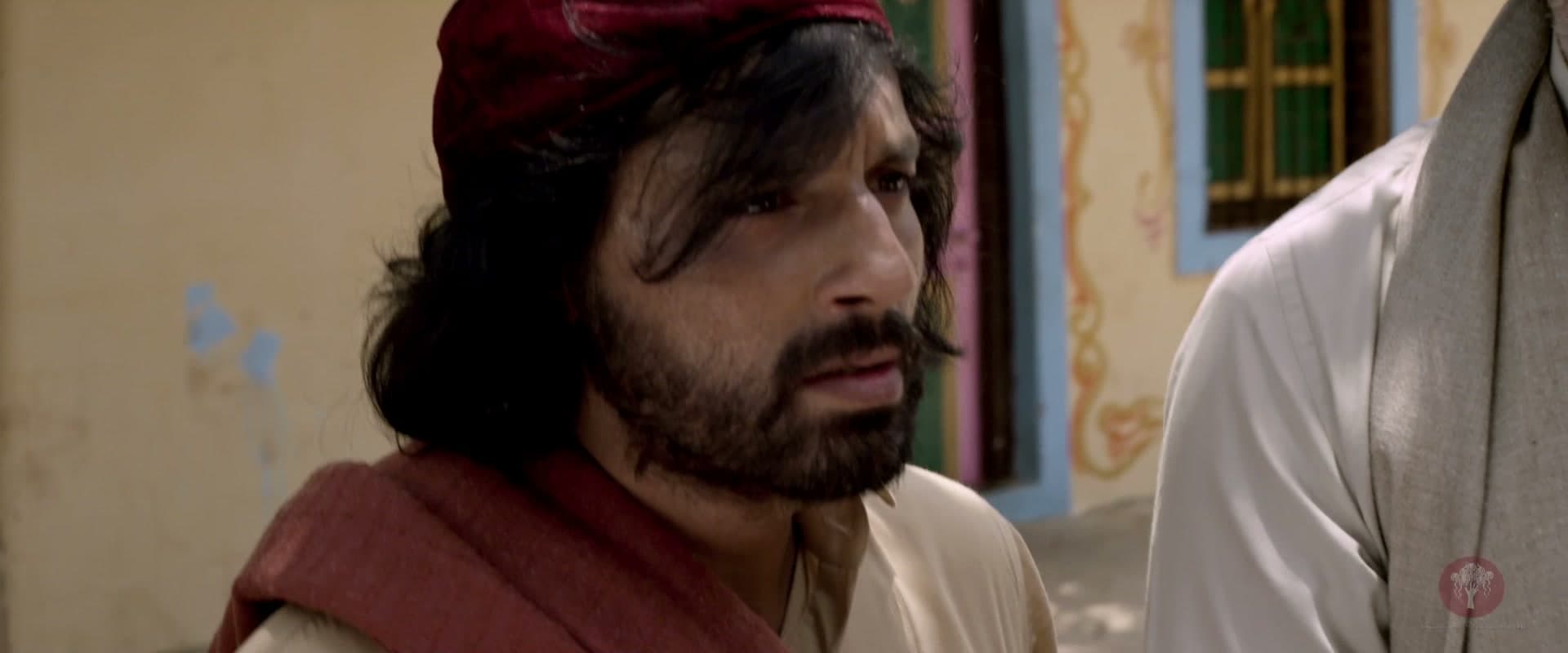 One of the musicians from Lahore in a village lane