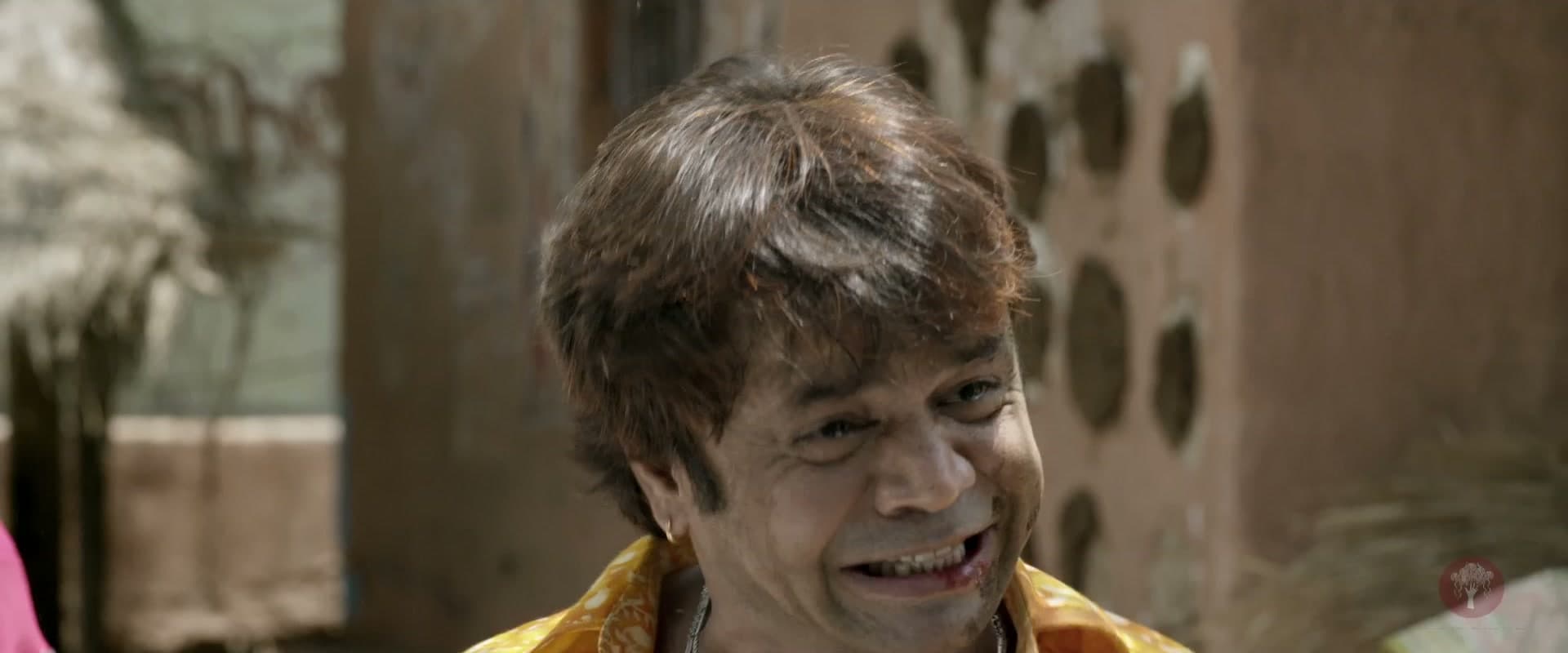 Tubelight grinning in a village lane