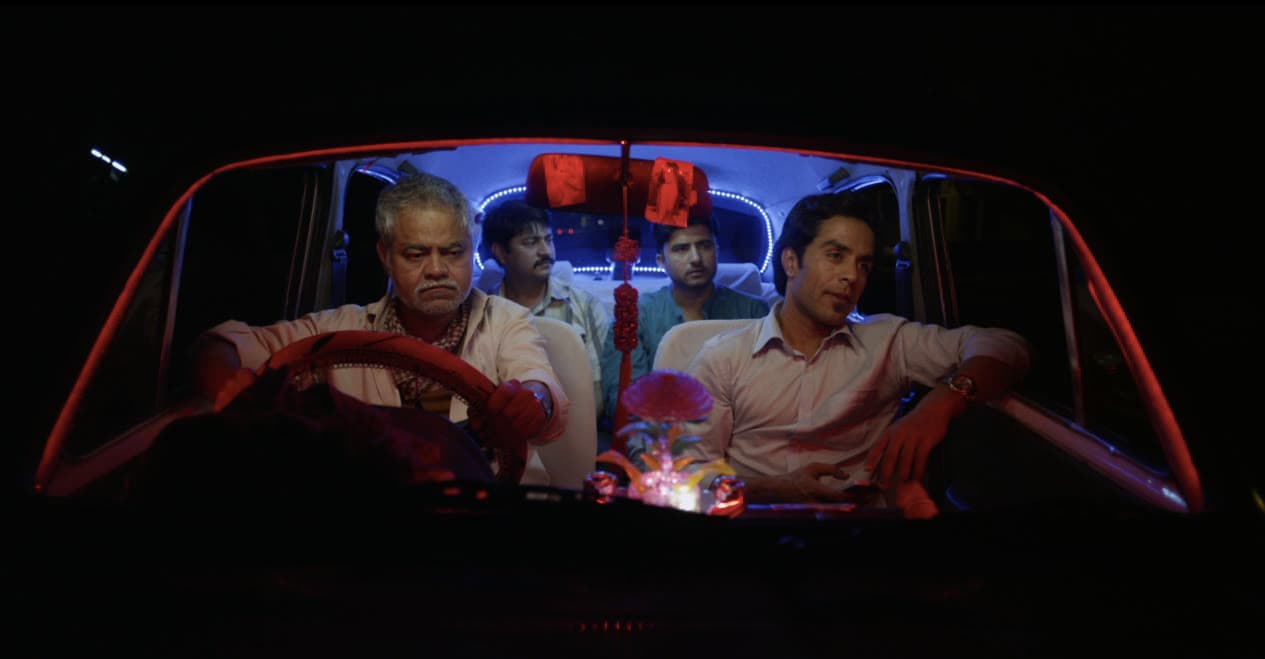 Firoz drives the three brothers through the night